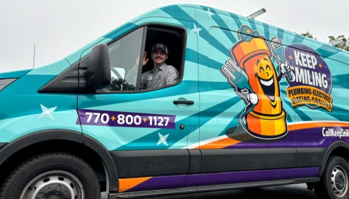 Technician Waving From Van